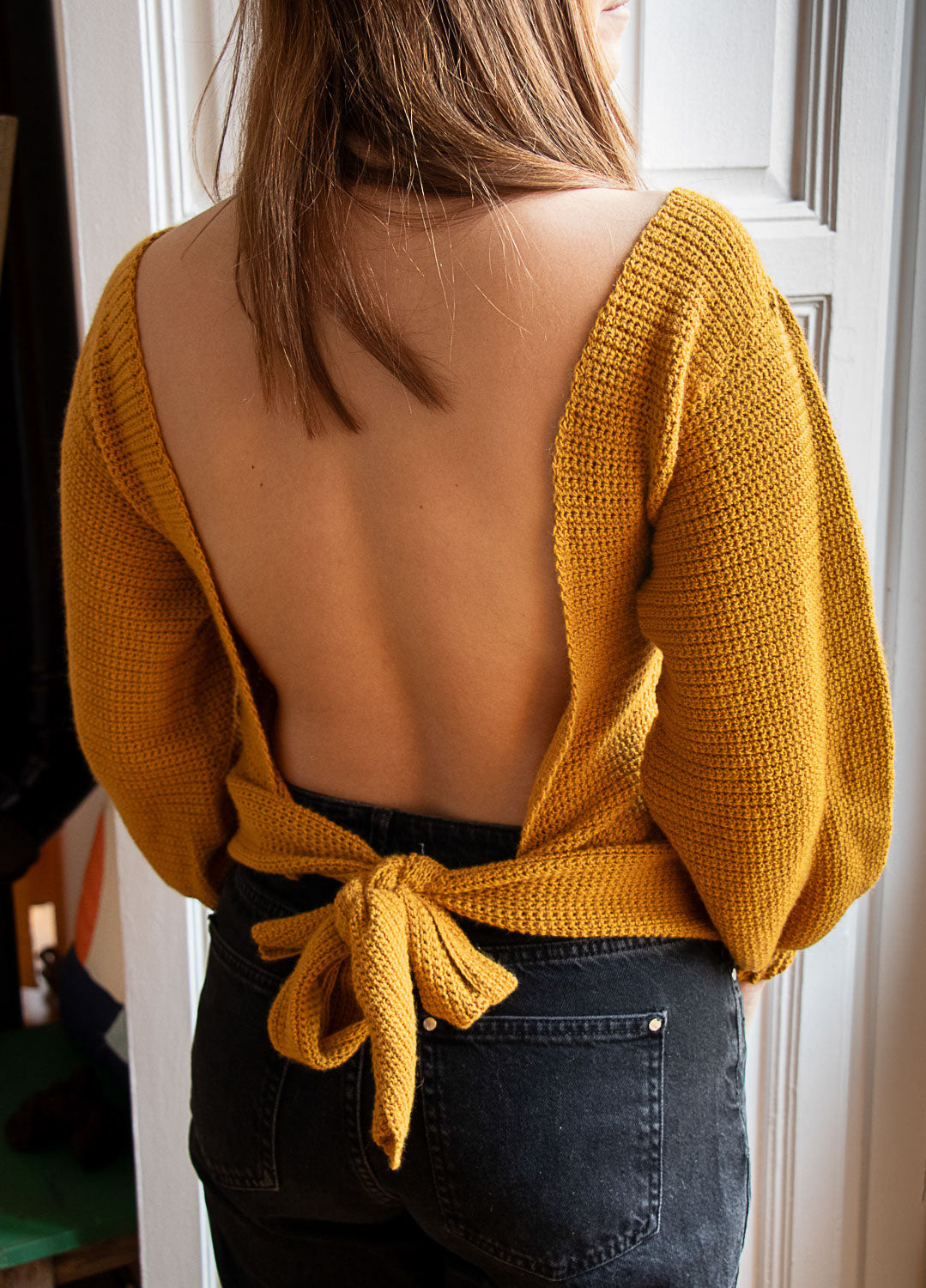 Open back hot sale twist sweater